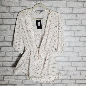 Low v neck top with small polka dots